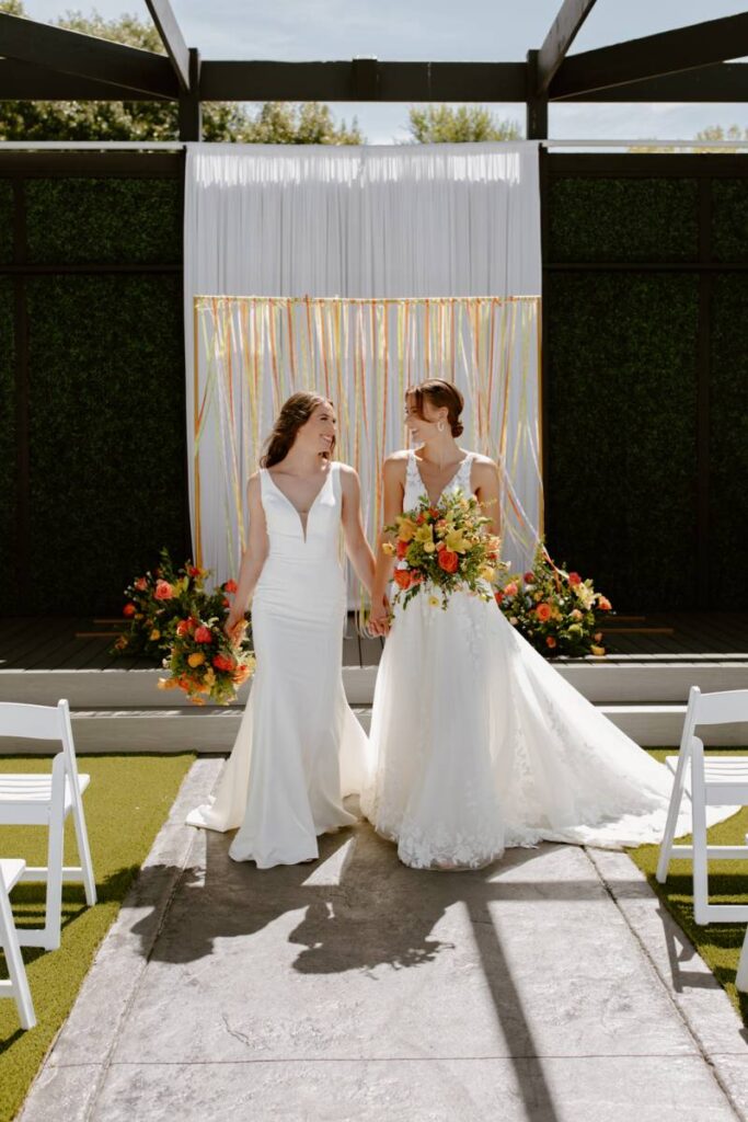 A CHEERFUL CITRUS-INSPIRED WEDDING DESIGN AT CELEBRATIONS ON THE RIVER IN LA CROSSE WISCONSIN