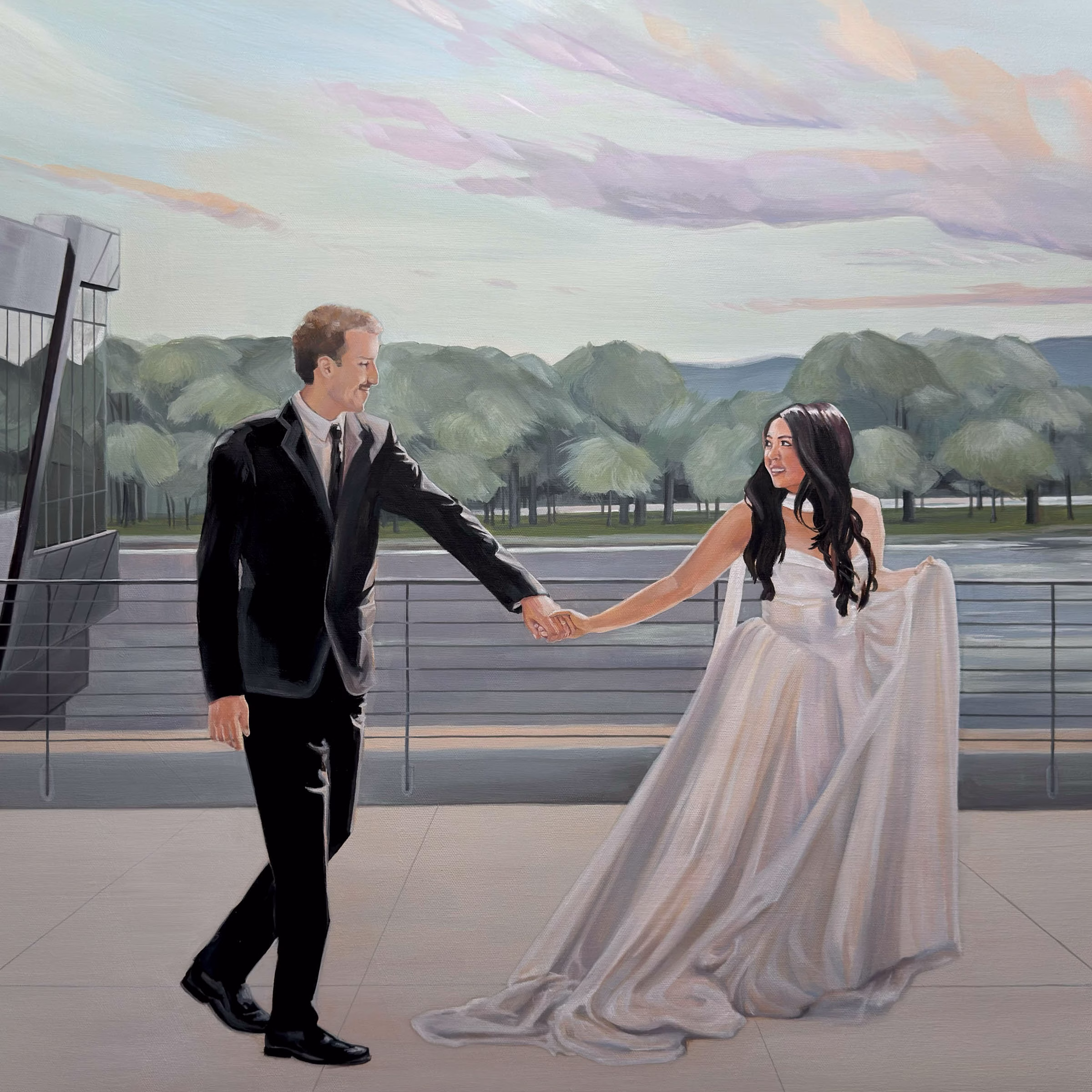 A finished live wedding painting by The Artist Brenda Berg, depicting a bride and groom holding hands and sharing a joyful look as they walk along a modern outdoor terrace. The groom wears a classic black suit and tie, while the bride with long dark hair holds up the skirt of her elegant white wedding gown. The background features a metal railing overlooking a wide river, lined with lush green trees beneath a soft pastel sunset sky.