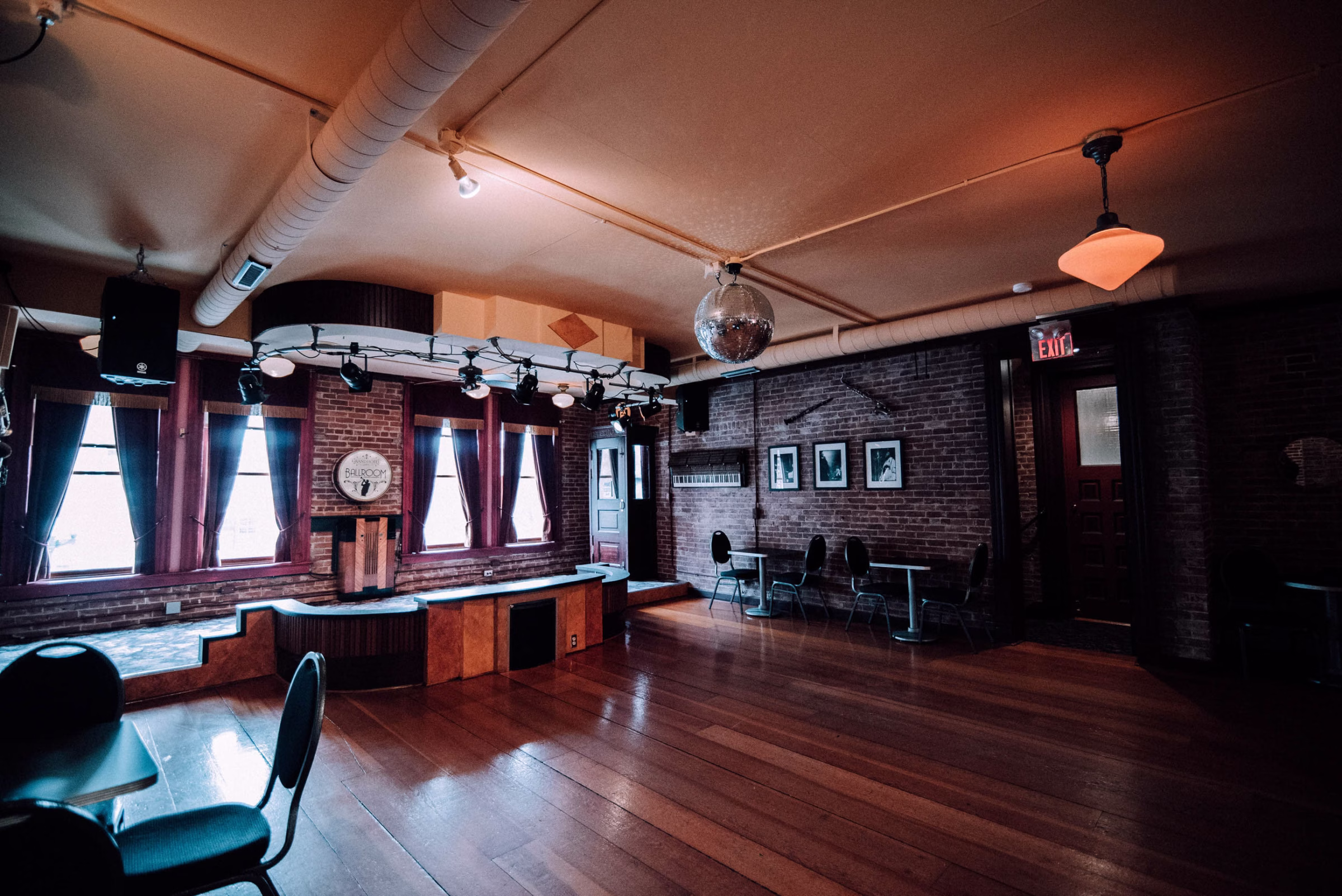 The Grand Hotel Ballroom historic wedding venue dance floor with disco ball in La Crosse, Wisconsin
