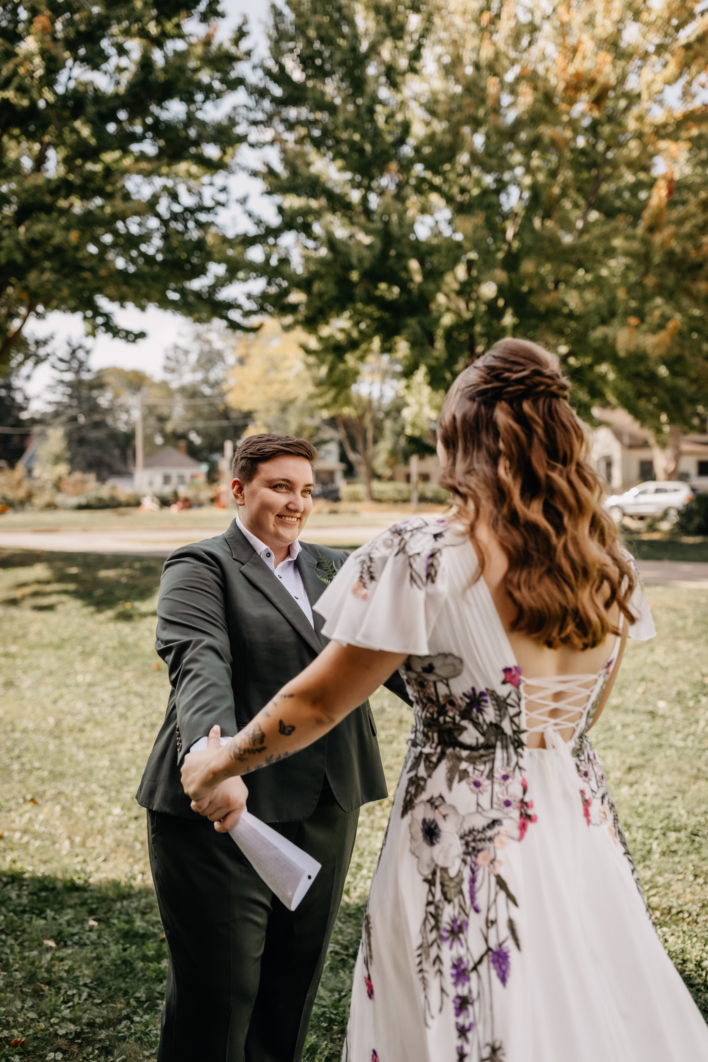 Janine beams at her future wife during their first look