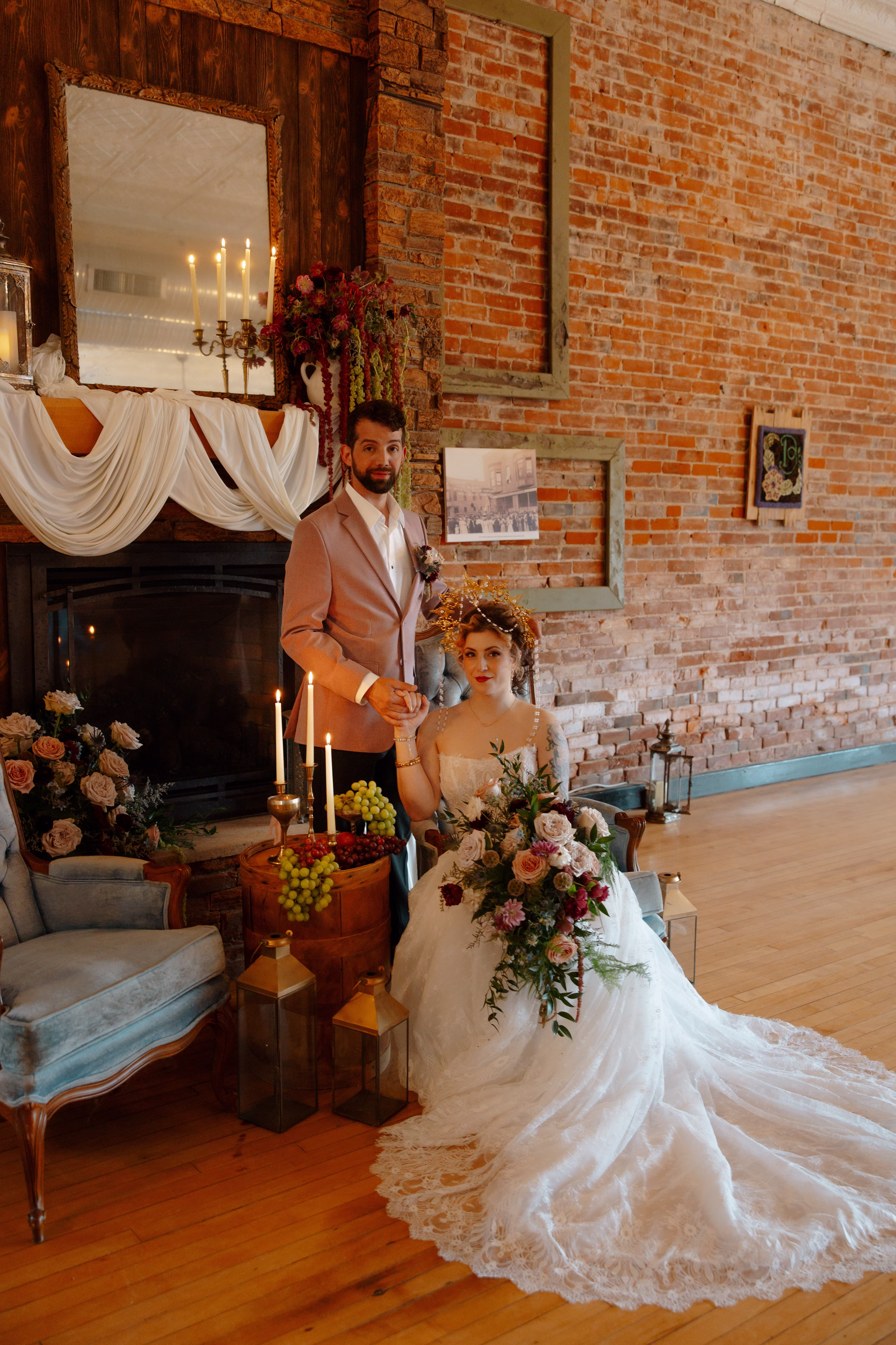 the bride and groom pose in the lounge at B's Place Event Venue in West Salem, Wisconsin