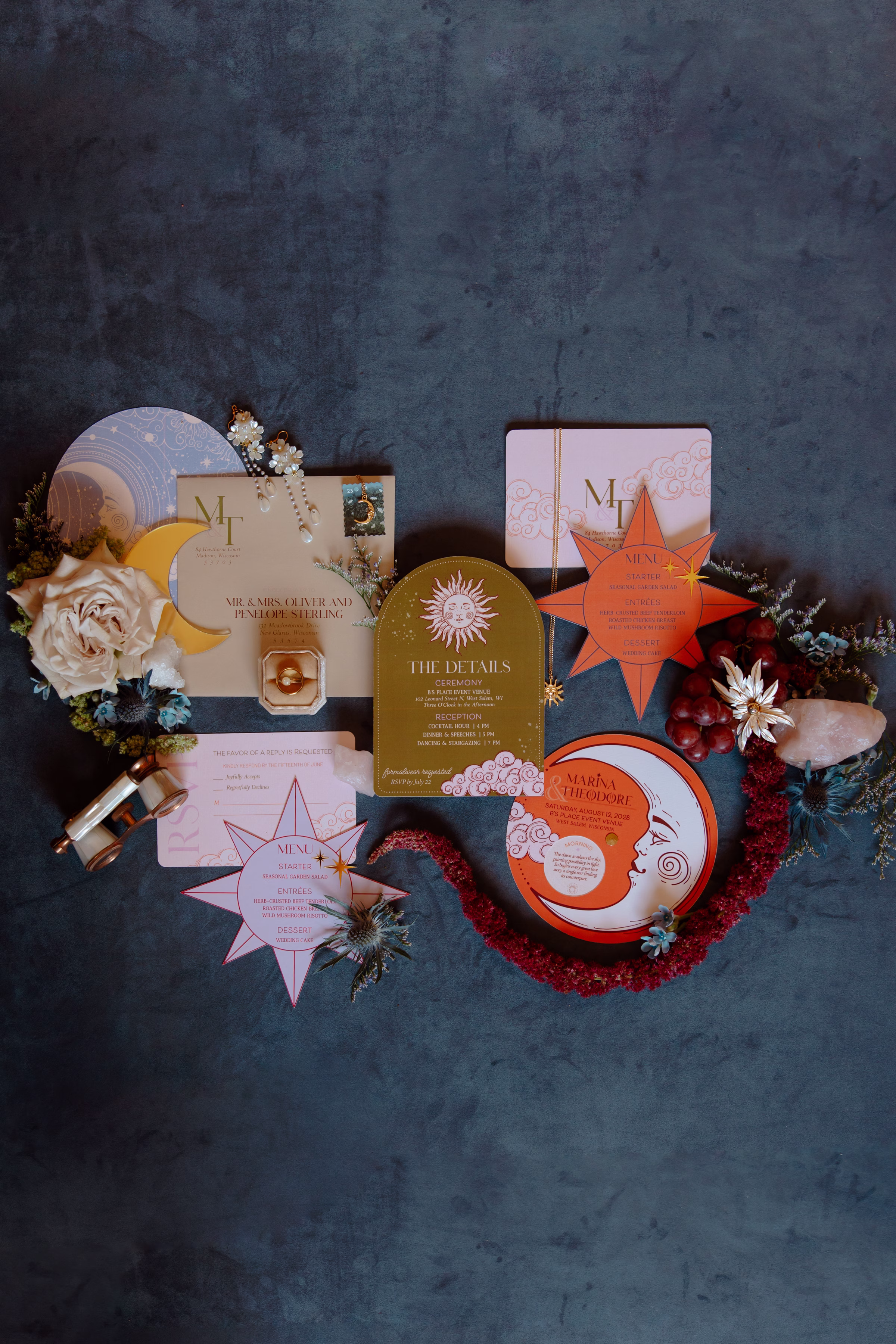 celestial inspired, contour-cut wedding stationery pieces by LK Bridal Studio in blush, orange, gold, and dusty blue