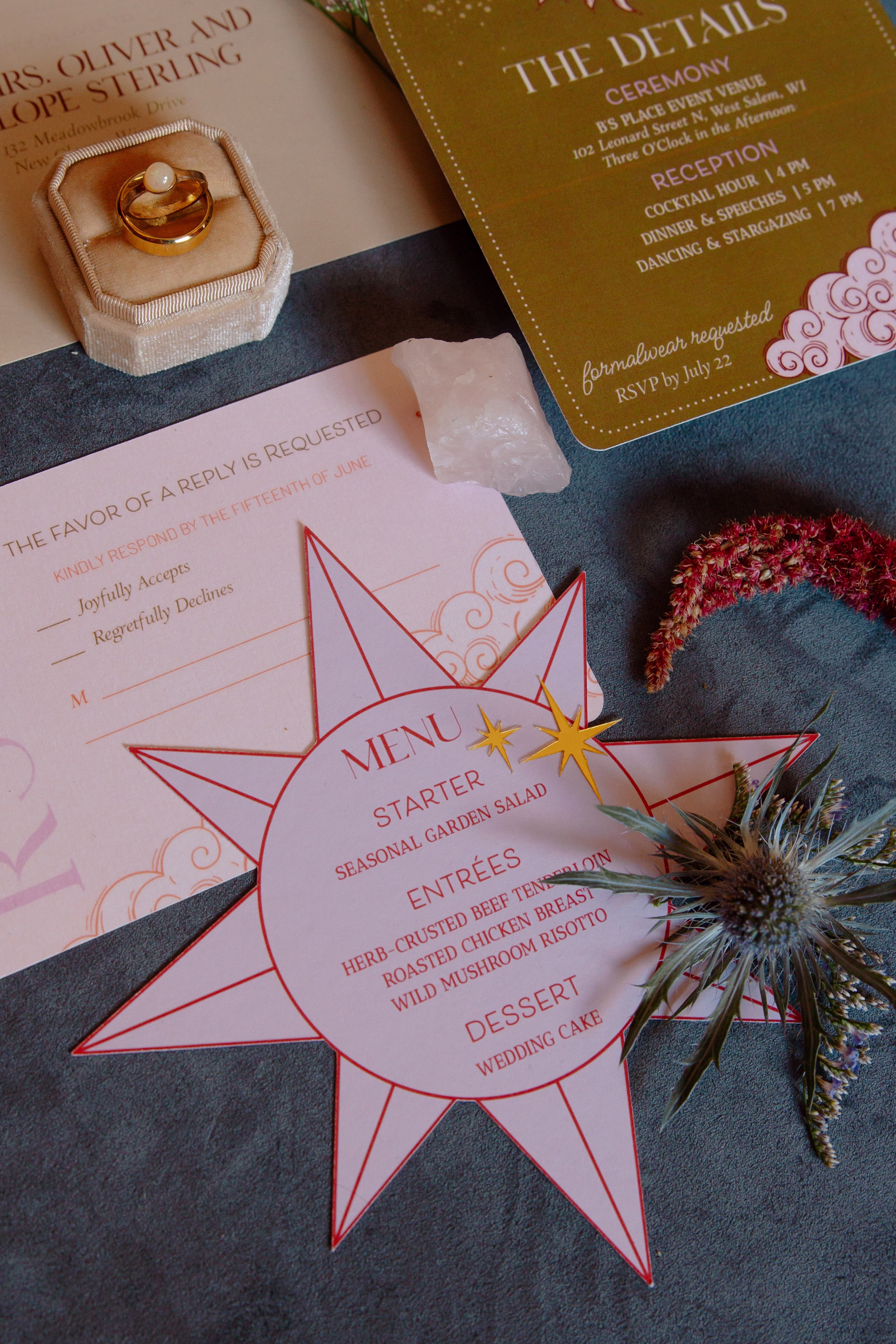a close up shot of a star-shaped, contour cut, blush wedding menu
