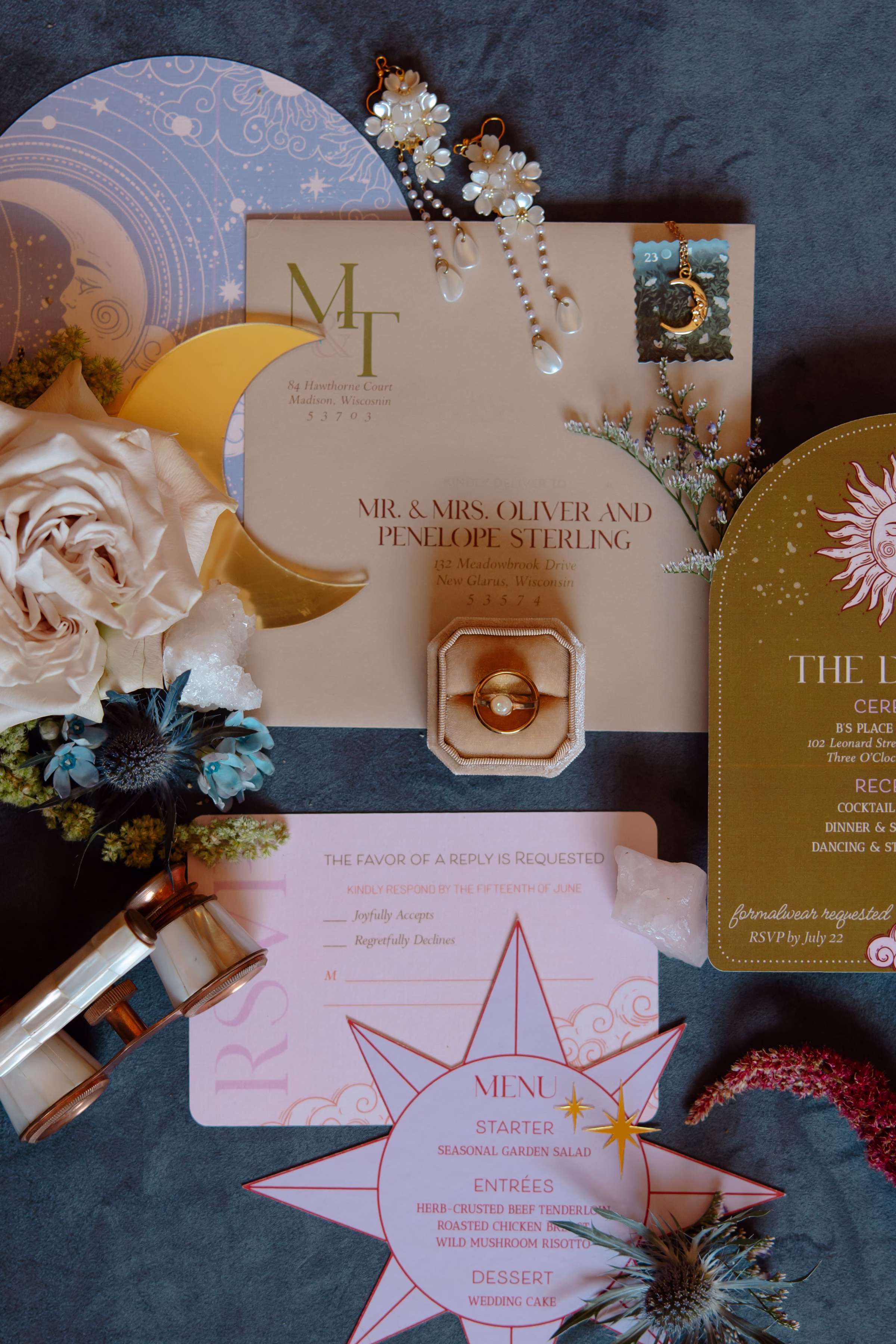 celestial inspired, contour-cut wedding stationery pieces by LK Bridal Studio in blush, orange, gold, and dusty blue