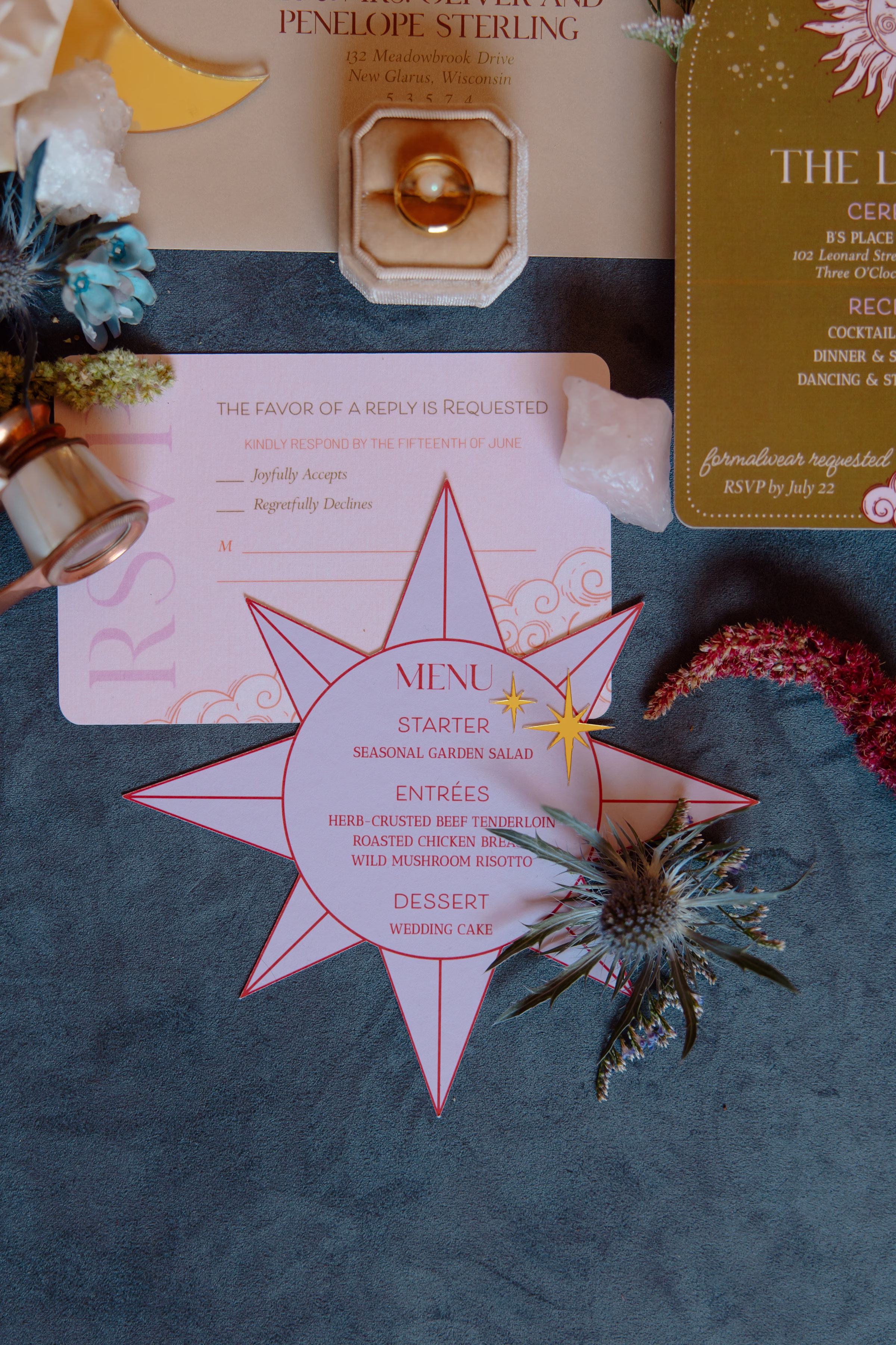celestial inspired, contour-cut wedding stationery pieces by LK Bridal Studio in blush, orange, gold, and dusty blue