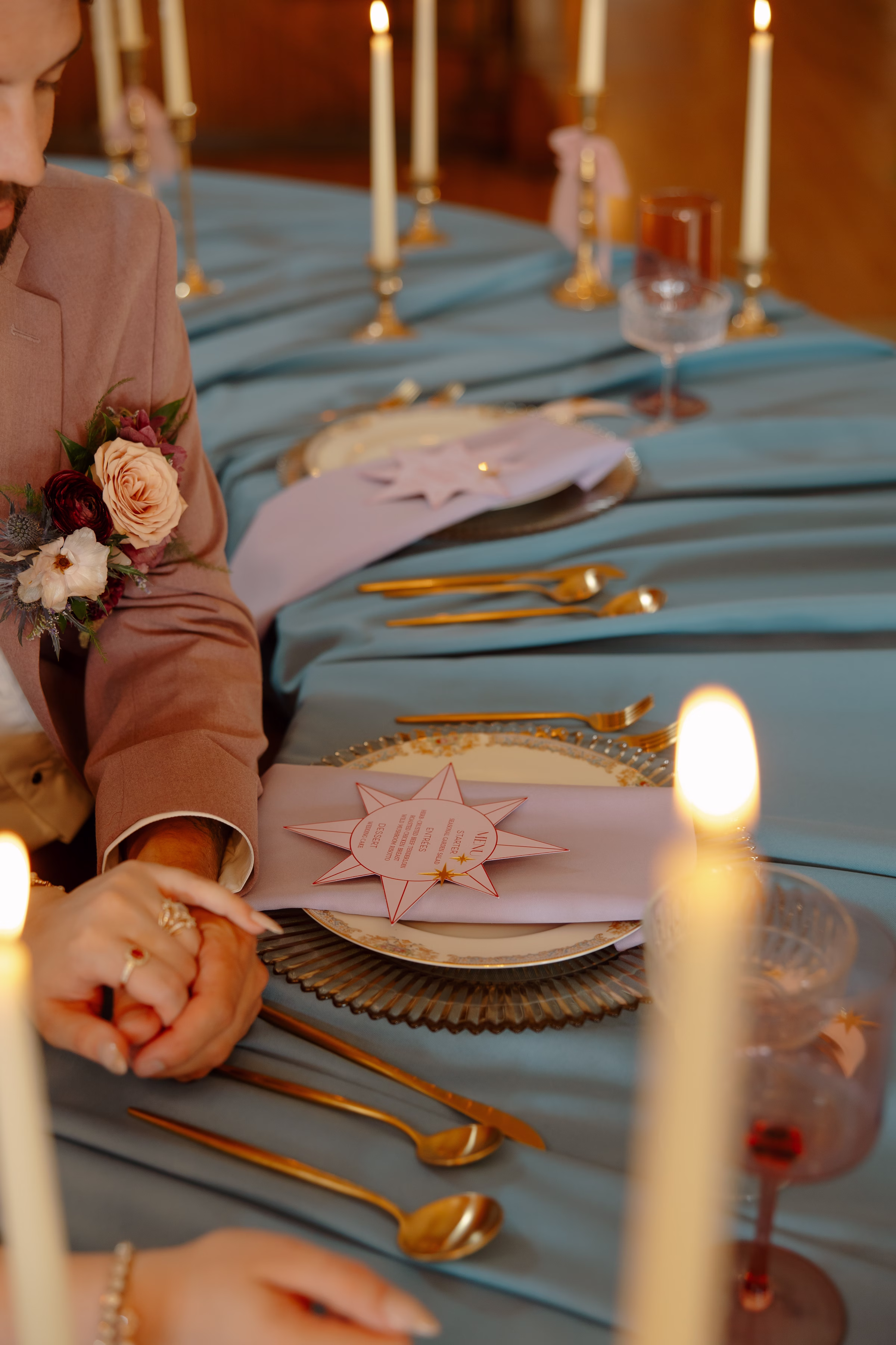 a detail shot of the contour-cut star wedding menus from LK Bridal Studio