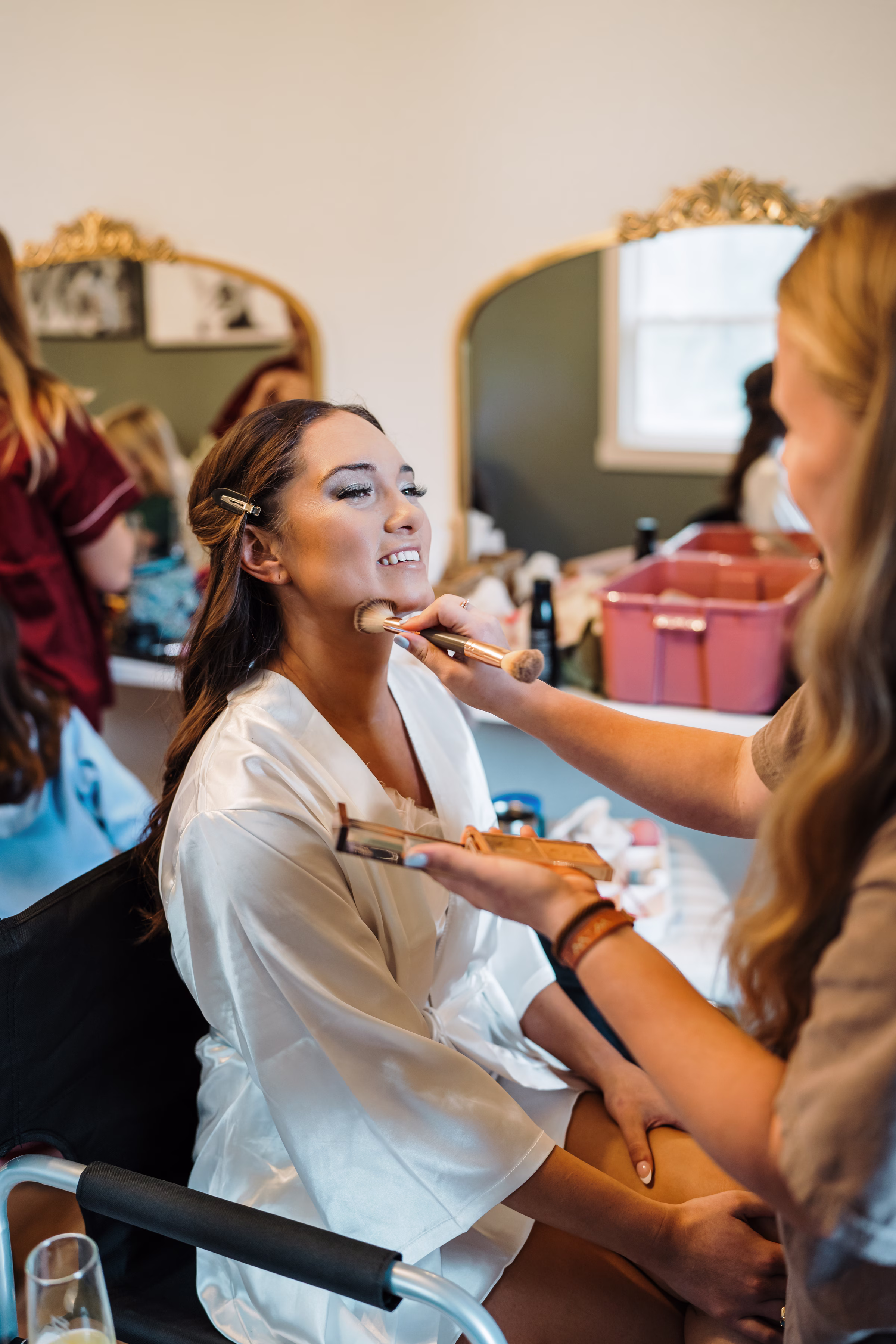 scenic fall wedding winnebago springs minnesota bridal preparation 3527 - An Elegant Fall Wedding at Winnebago Springs | Emma & Tyler Makeup artist Amber Ralston does bride Emma's makeup on her big day