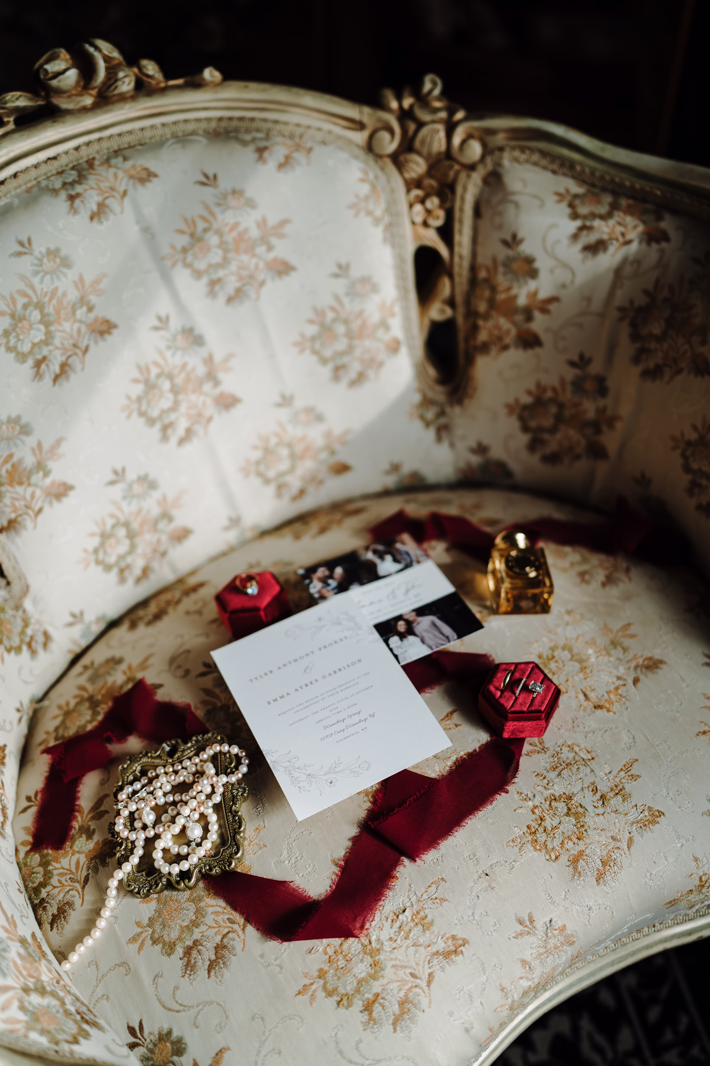 scenic fall wedding winnebago springs minnesota stationery details 3436 - An Elegant Fall Wedding at Winnebago Springs | Emma & Tyler fall wedding stationery sit on an ornate vintage chair at Winnebago Springs in Minnesota